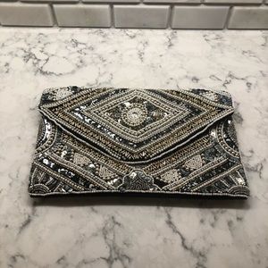 Embellished clutch/ cross over bag